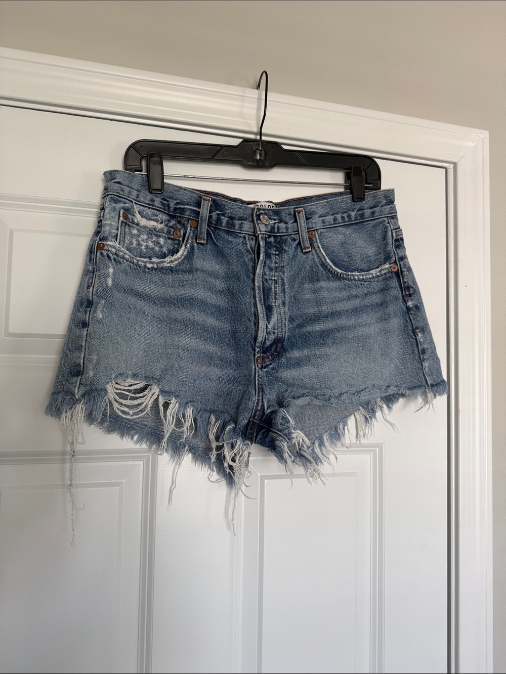 Agolde Distressed Light Blue Denim Cutoff Shorts